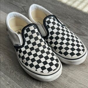 Vans Black and White Checkered Slip-On Sneakers